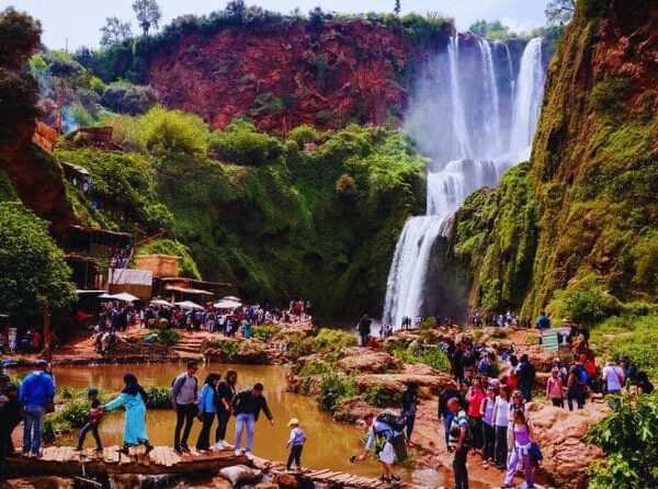 Tourists hiking near the base of Ouzoud Falls